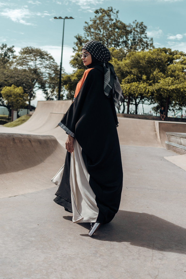 Muslimah model in Singapore wearing oversized streetwear ghutra keffiyeh batwing open abaya with hijab