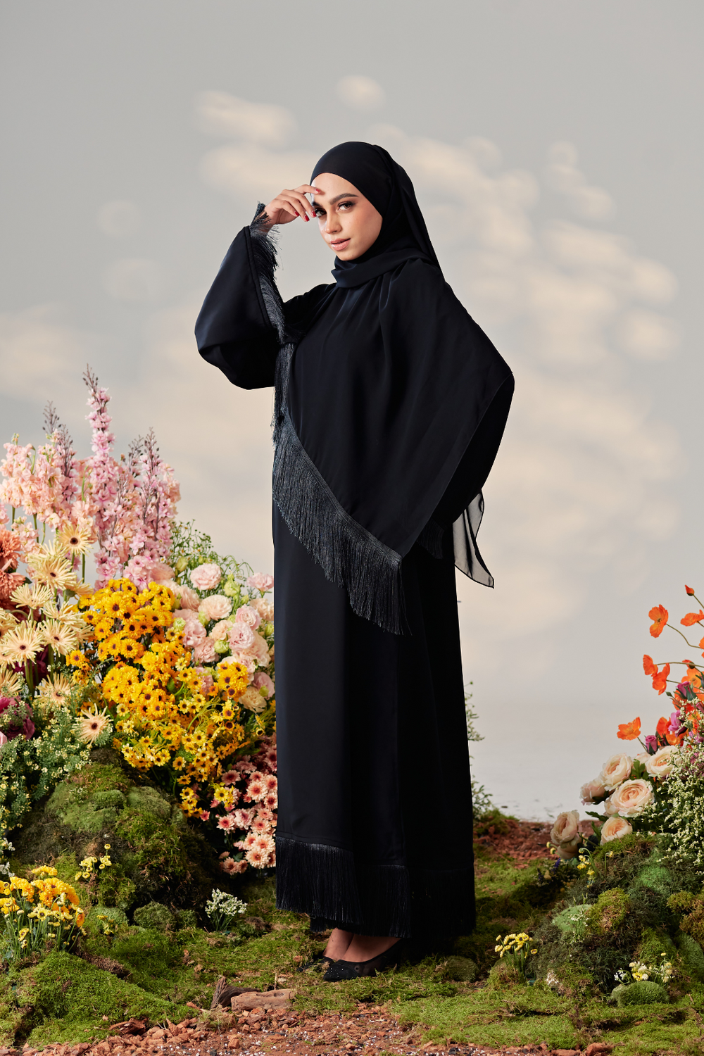 Malaysian model muslimah in nidha abaya with frills on sleeves and hem for Eid 2023